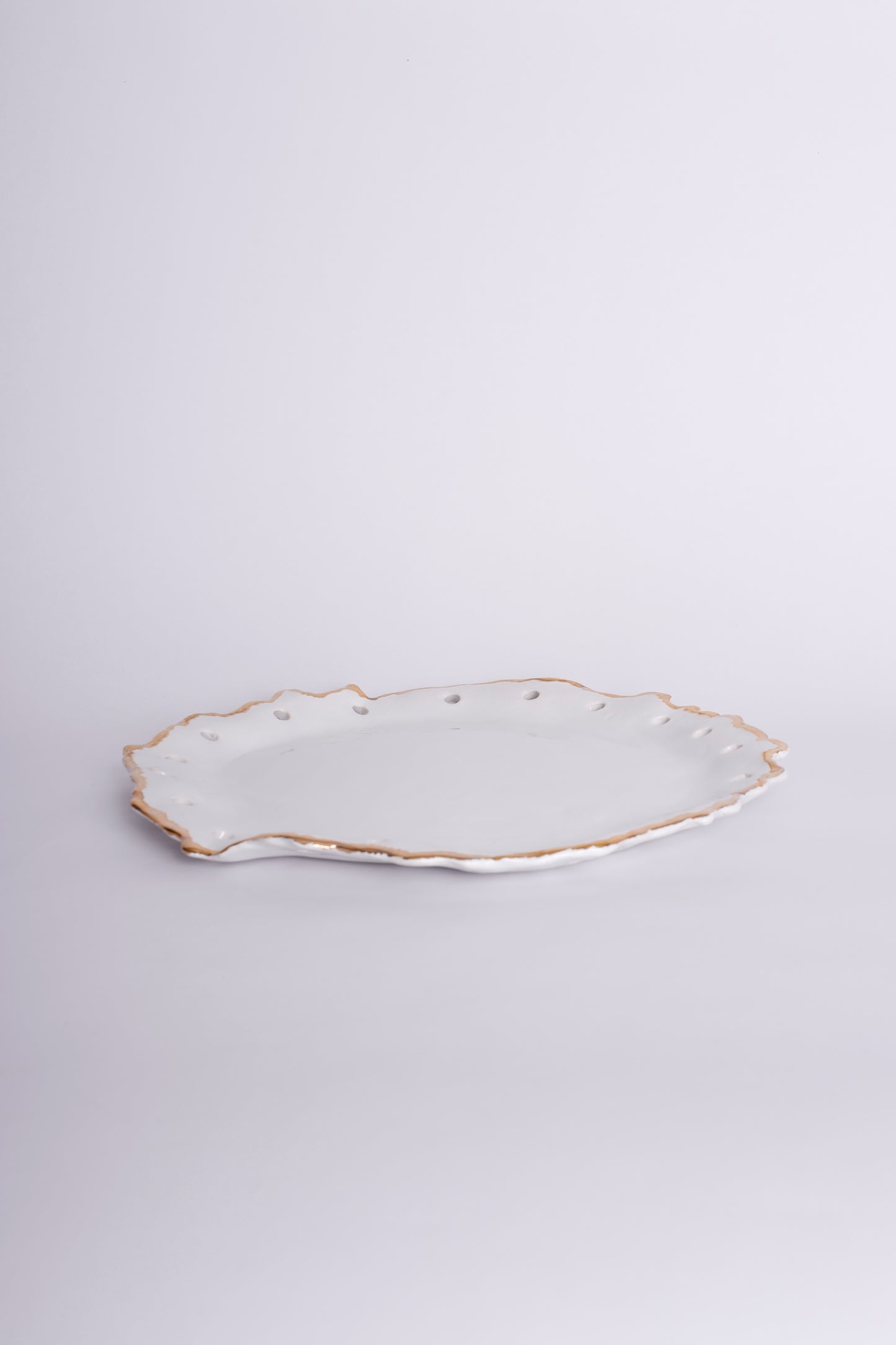 Platter with Gold and Perforations